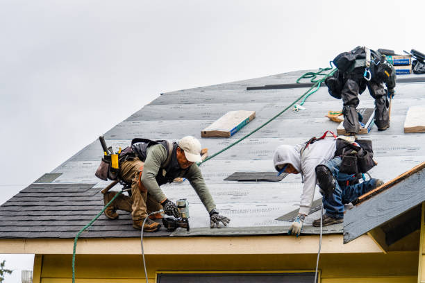 Professional Gutter Installation technician working in Ludlow, VT